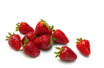 Fresones  sobre fondo blanco, vista cenital. Strawberries on white background, overhead view.