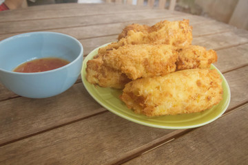 The sauce chicken,On a brown wood table,In Phuket Thailand