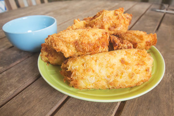 The sauce chicken,On a brown wood table,In Phuket Thailand