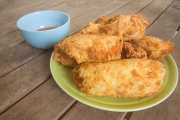 The sauce chicken,On a brown wood table,In Phuket Thailand