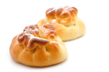 Homemade sweet buns with powdered sugar. Isolated on white background. Sweet pastries.