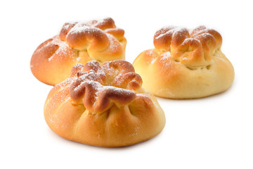 Homemade sweet buns with powdered sugar. Isolated on white background. Sweet pastries.