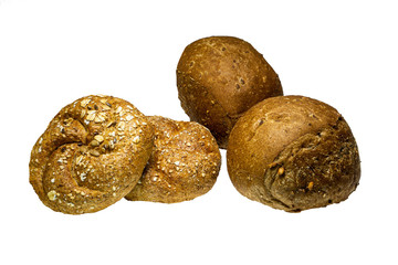 Freshly baked delicious bread with various seeds, (pumpkin, flax, oatmeal, millet), isolated on a white background, close-up.
