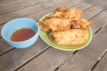 The sauce chicken,On a brown wood table,In Phuket Thailand