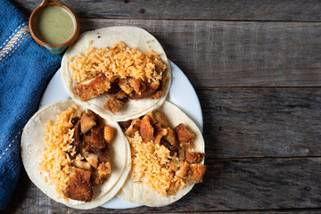 Mexican chicken milanese tacos with red rice