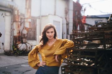 High fashion model walking down the street.