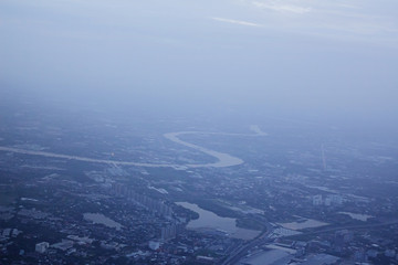 High angle top view on plane,Chao Phraya River Thailand's major rivers Bangkok Thailand capital, At evening at 4 o'clock,Tropical zone asia.