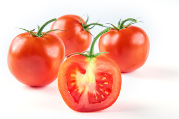 Fresh sliced tomatoes isolated on white background. Background of organic food.