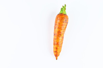 Fresh carrot isolated on white background. The view from the top. Organic food background.