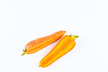 Fresh sliced carrots on white background, top view. Background of organic food.