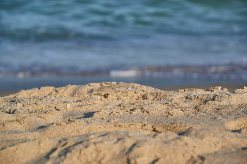 Fototapeta na wymiar sun of summer time on sky and sand of beach. Happy moments