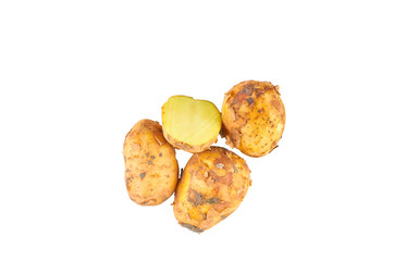Fresh white potatoes isolated on white background. The view from the top. Organic food background.
