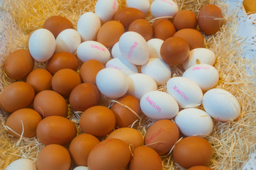 Different eggs on stall at marketplace