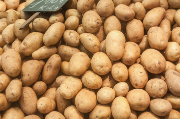 Organic potatoes on market stall
