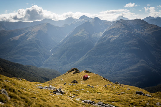 Remote wilderness hut in mountain scene in New Zealand