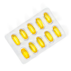 Omega 3 capsules package in blister. Top view fish oil capsules, closeup isolated on white background.