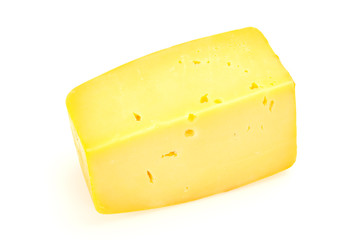 Hard yellow tasty cheese brick