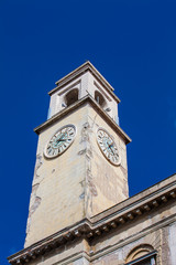 Fototapeta na wymiar Clock tower of the historical Palazzo Gambacorti built on the 14th century