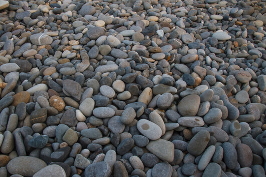 Abstract background with stones. Pebbles, coast. Abstract background with stones.