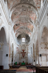 Fototapeta premium Old church temple under reconstruction city
