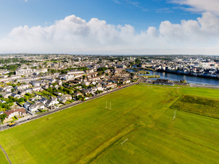 Fototapeta na wymiar South park, Aerial view, Tilt shift effect, sunny warm day, cloudy sky, Galway city, Claddagh, Ireland.