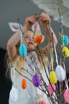 Young girl decorating for easter