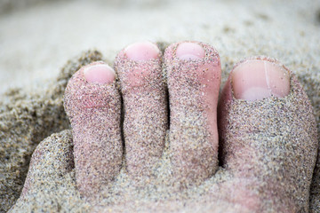 Feet in the sand