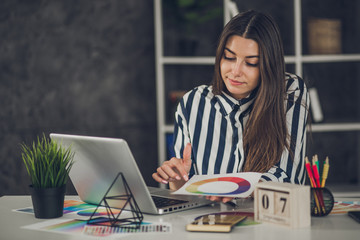 Young perspective web designer and blogger in modern office