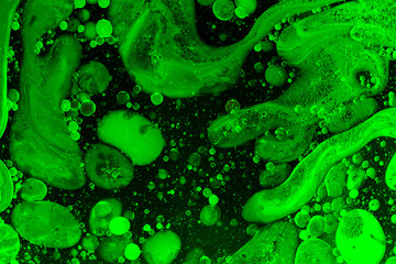Obraz premium Green liquid bubbles abstract background. Macro photography