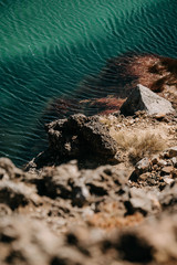 sea lake blue emerald rock