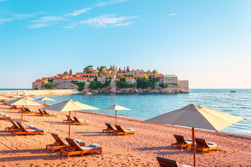 Picturesque summer view to the Sveti Stefan island with private beach, luxury resort on the...