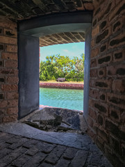 Look through a brick window at Fort Jefferson, Dry Tortugas National Park
