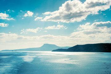 View of a sea coast under blue sky