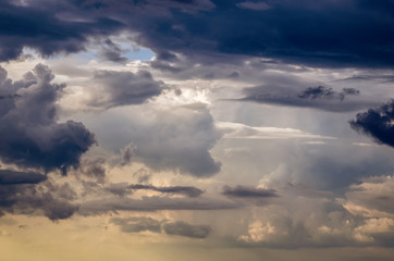 Beautiful stormy cumulus clouds in the sky, background.