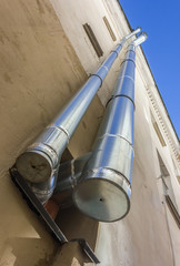 Obraz premium Steel ventilation pipes on the wall
