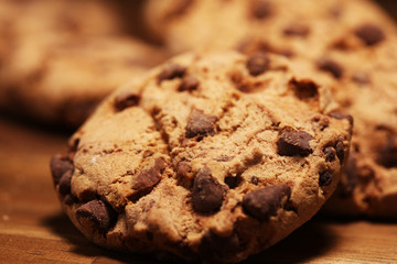 Chocolate cookies on wooden table. Chocolate chip cookies