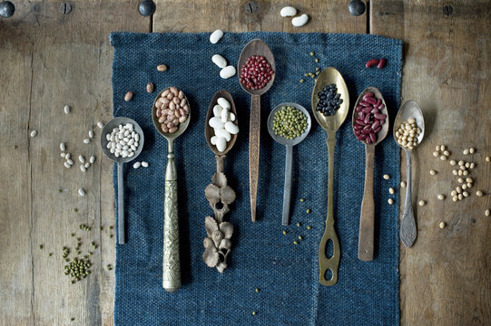 Spoons of various dried beans