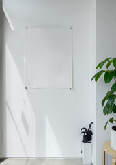 empty poster on the white wall with plan