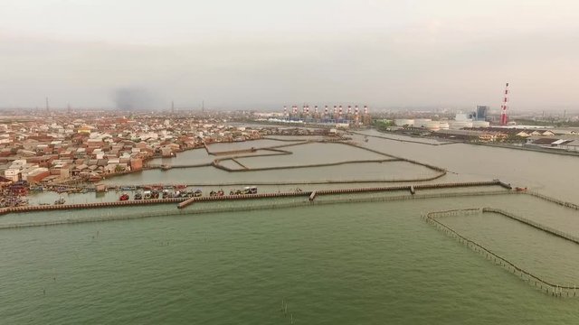 aerial view sunset Tanjung Emas Harbour , Tambak Lorok Vilages Semarang Central Java Indonesia