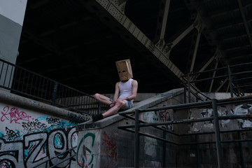 Obraz na płótnie Canvas Man with a package on his head