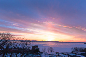 Fototapeta premium sunset over frozen lake