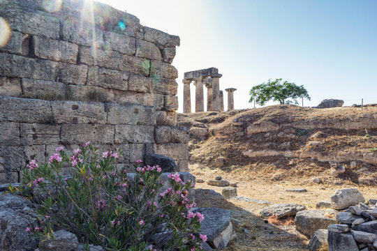 Archaeological site with archaic Temple of Apollo, Dorian columns, Corinth, Greece