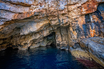 Turquoise water inside Blue Caves