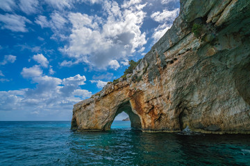 Fototapeta na wymiar Stone arch entrance to one of Blue Caves