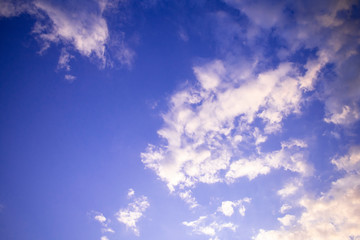 Sky background with beautiful clouds in purple shades. Texture. Beautiful blue shades. Sky with clouds.