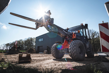 Fototapeta premium Radlader im Sonnenlicht