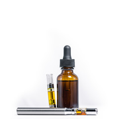 Marijuana Oil Dropper and Vape Pen on White Backgorund