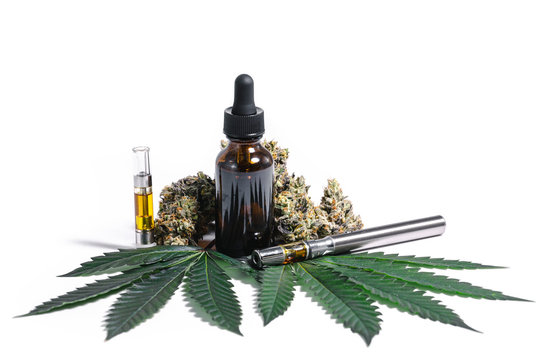 Medical Marijuana White Display of CBD Hemp Oil Buds Leaves and Vape Pen