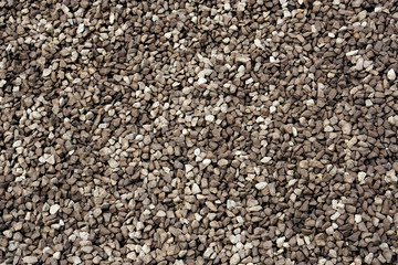 A closeup of a pile of loose rough stones