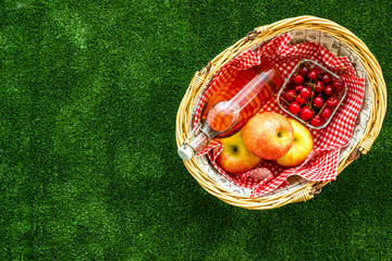 picnic in summer with products, fruits, drinks and hat on white background top view space for text